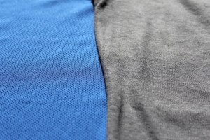On the left is our regular 100% polyester running t-shirt. On the right is the Gildan 100 % polyester knit running t-shirt